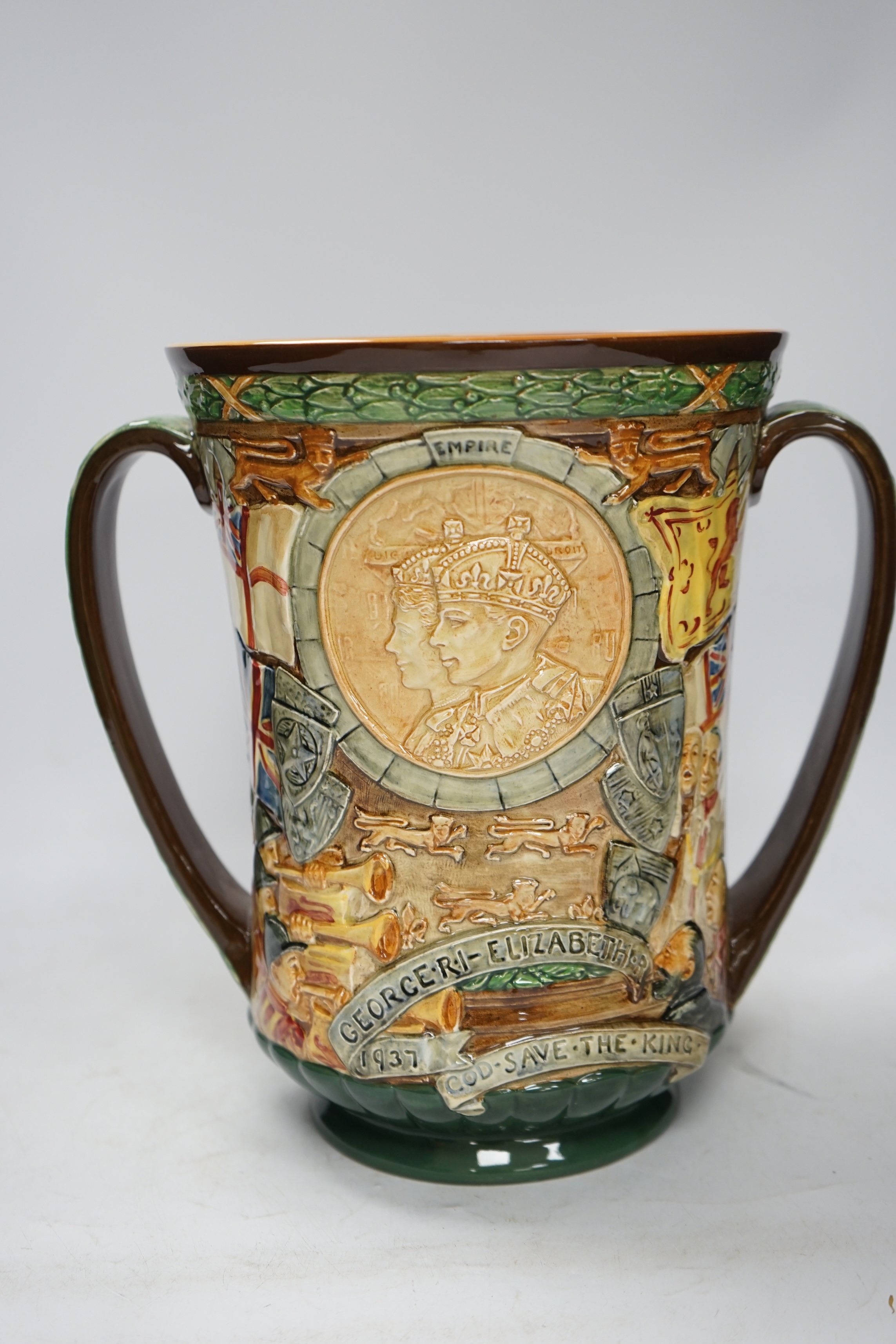 A Doulton commemorative cup, coronation of George VI and Elizabeth, 1937, with certificate signed by C.J. Noke, 26cm high. Condition - good